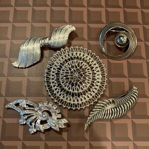 Five Silver Toned Brooches